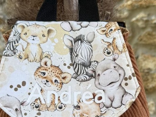 Rabat de sac à dos Gaspard en coton imprimé bébés animaux de la savane